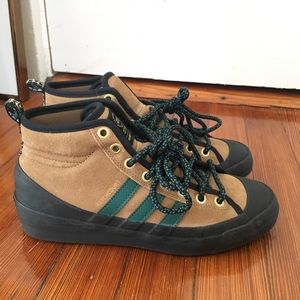 Adidas Matchcourt sneakers.